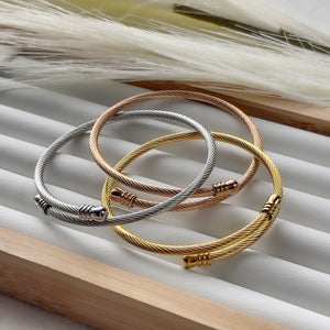 Three stainless steel Bangles