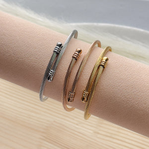 Three stainless steel Bangles